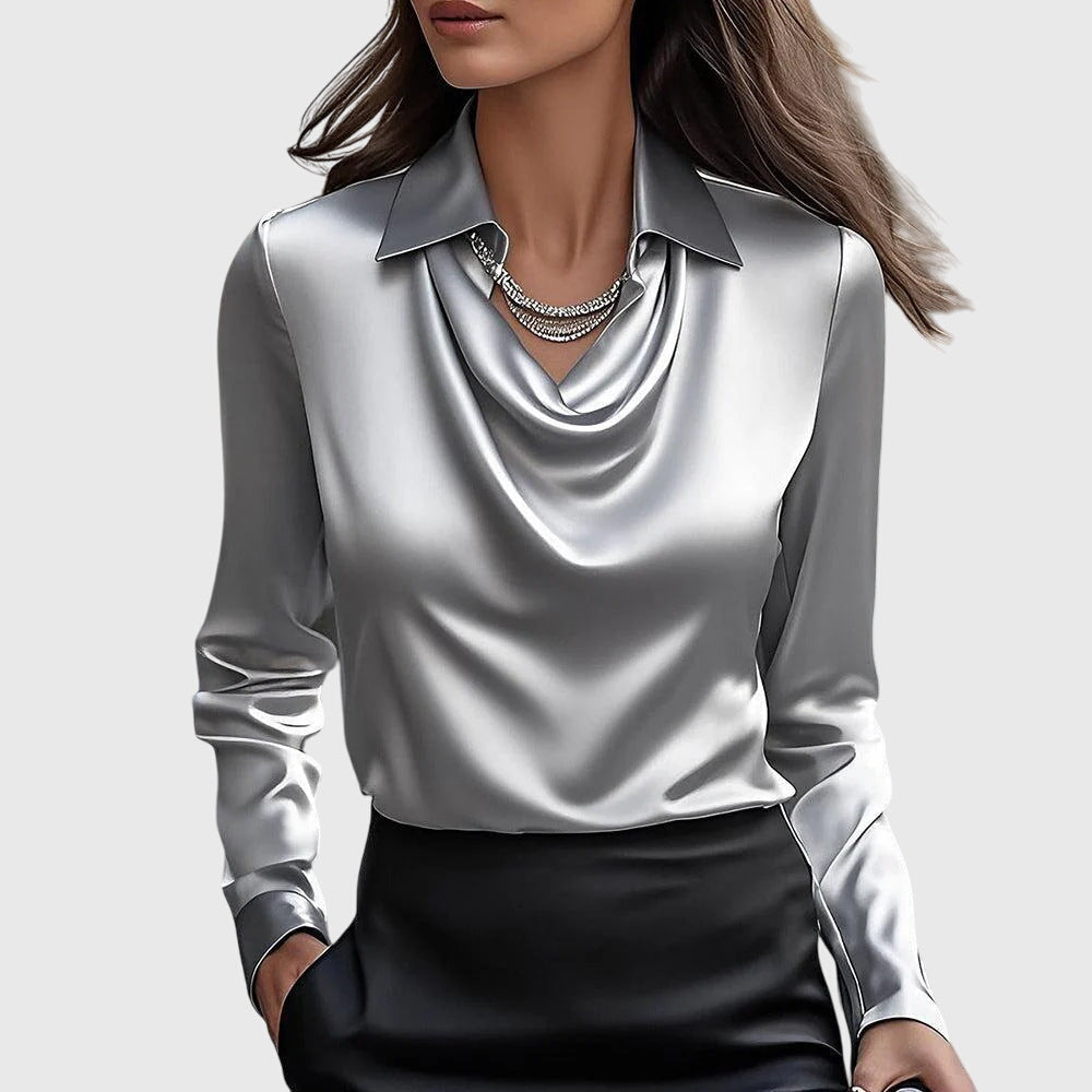 Elegantní dámská halenka s lichotivým řasením a splývavým střihem, vyrobená z jem 1