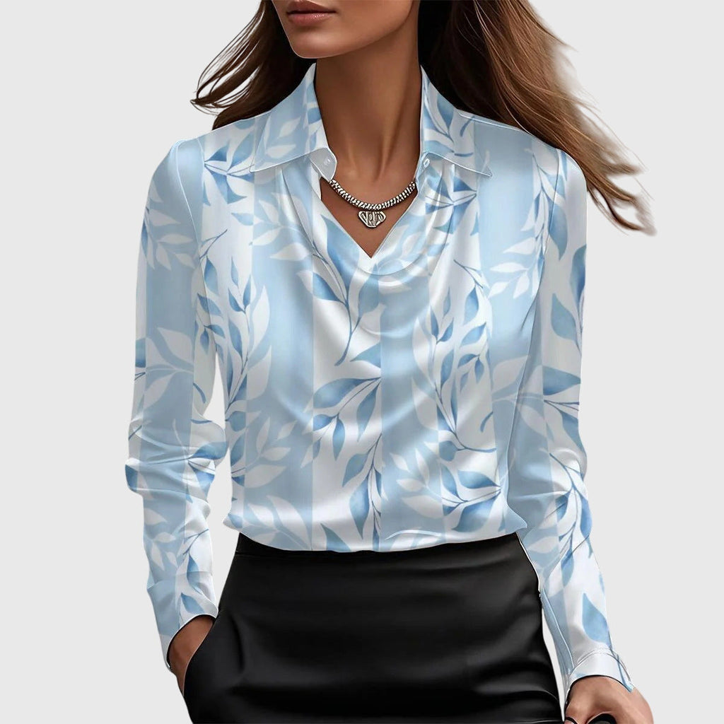 Elegantní dámská halenka s lichotivým řasením a splývavým střihem, vyrobená z jem 4