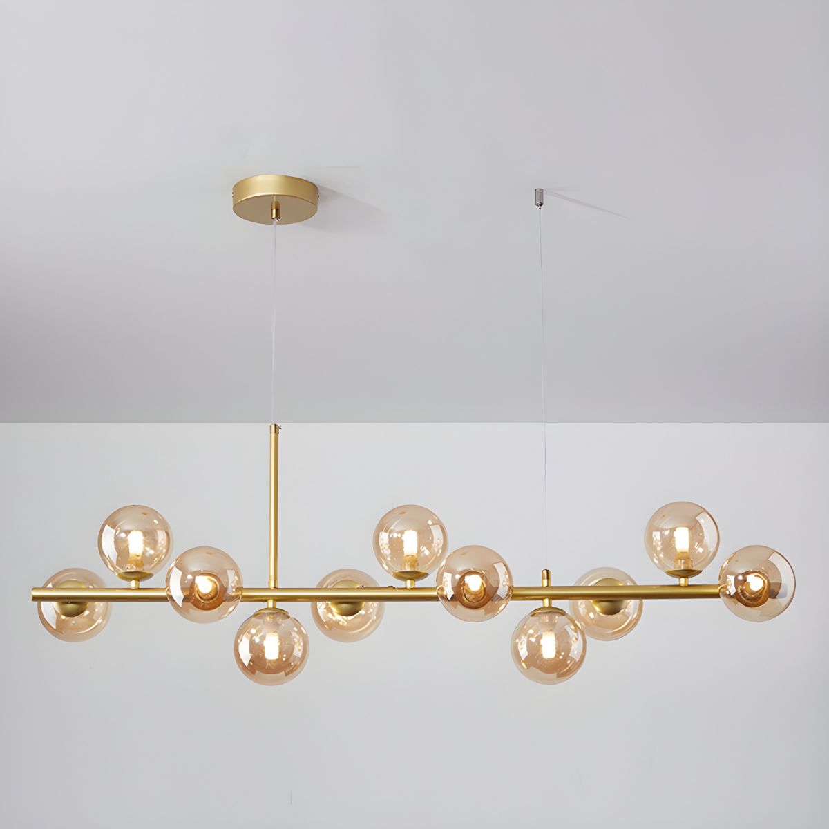 Modern chandelier with adjustable height featuring 11 glass globes and a black metal frame, ideal for living rooms and dining areas. 13