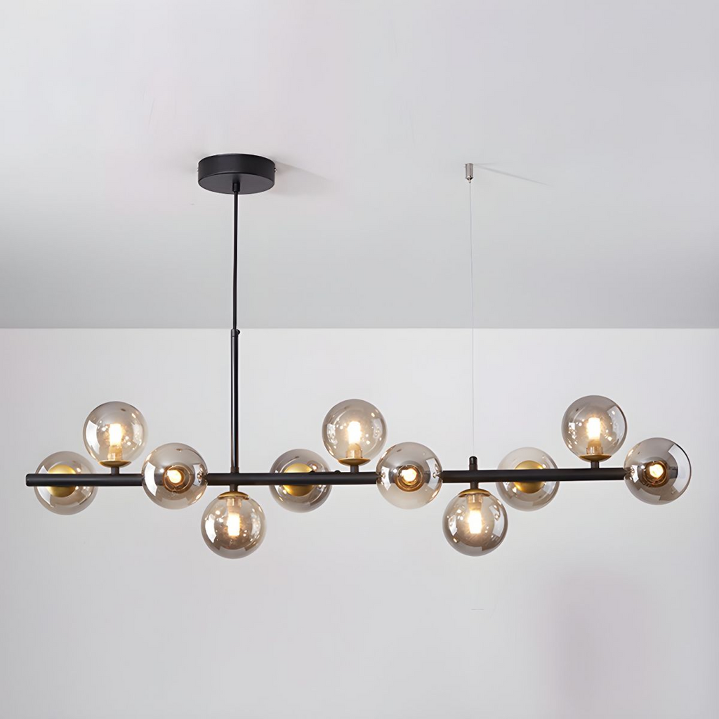 Modern chandelier with adjustable height featuring 11 glass globes and a black metal frame, ideal for living rooms and dining areas. 17