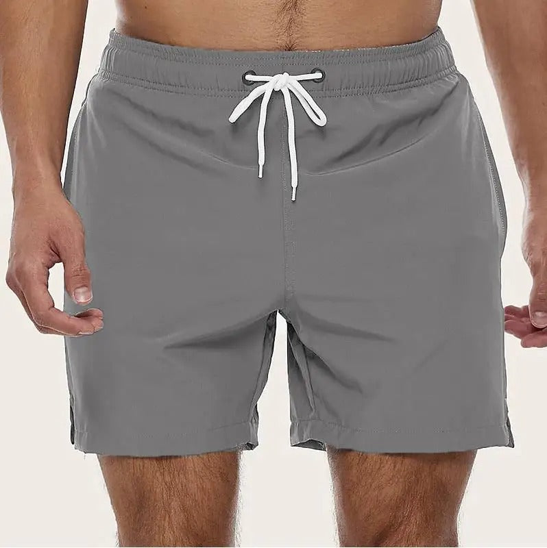 Pánské modré plavky z rychleschnoucího polyesteru s elastickým pasem, ideální pro vodní sporty 3