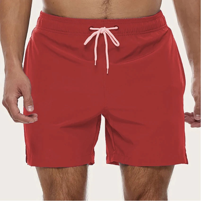 Pánské modré plavky z rychleschnoucího polyesteru s elastickým pasem, ideální pro vodní sporty 4