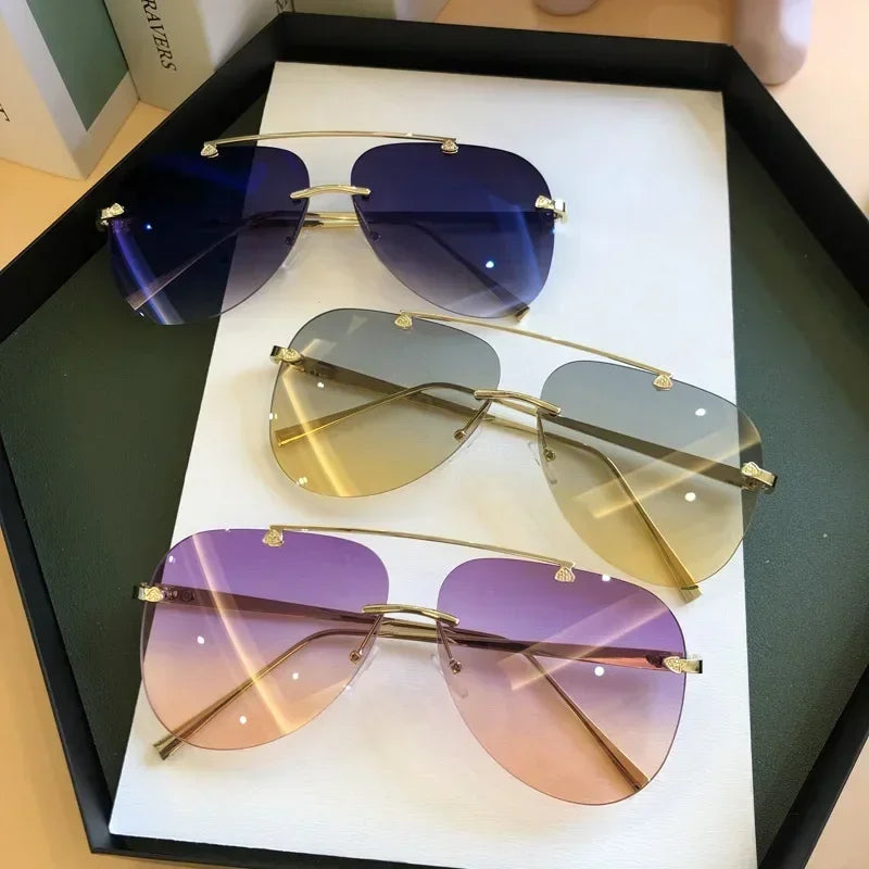 Sluneční brýle aviator bez obrouček, unisex model v černé a hnědé barvě, s gradientními 1